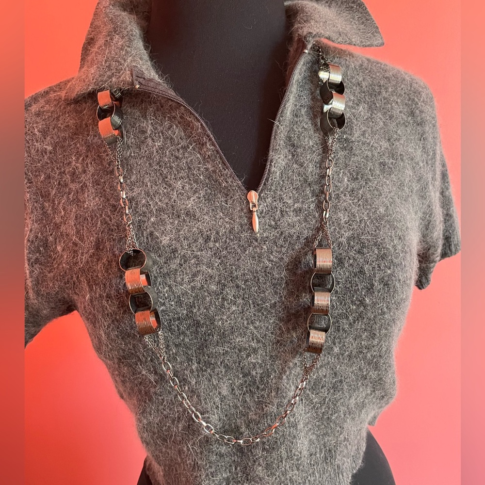 Long necklace.